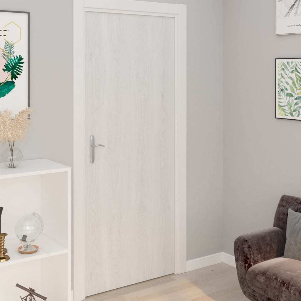 White wood self-adhesive film applied to door surface demonstrating waterproof rustic appearance and easy installation