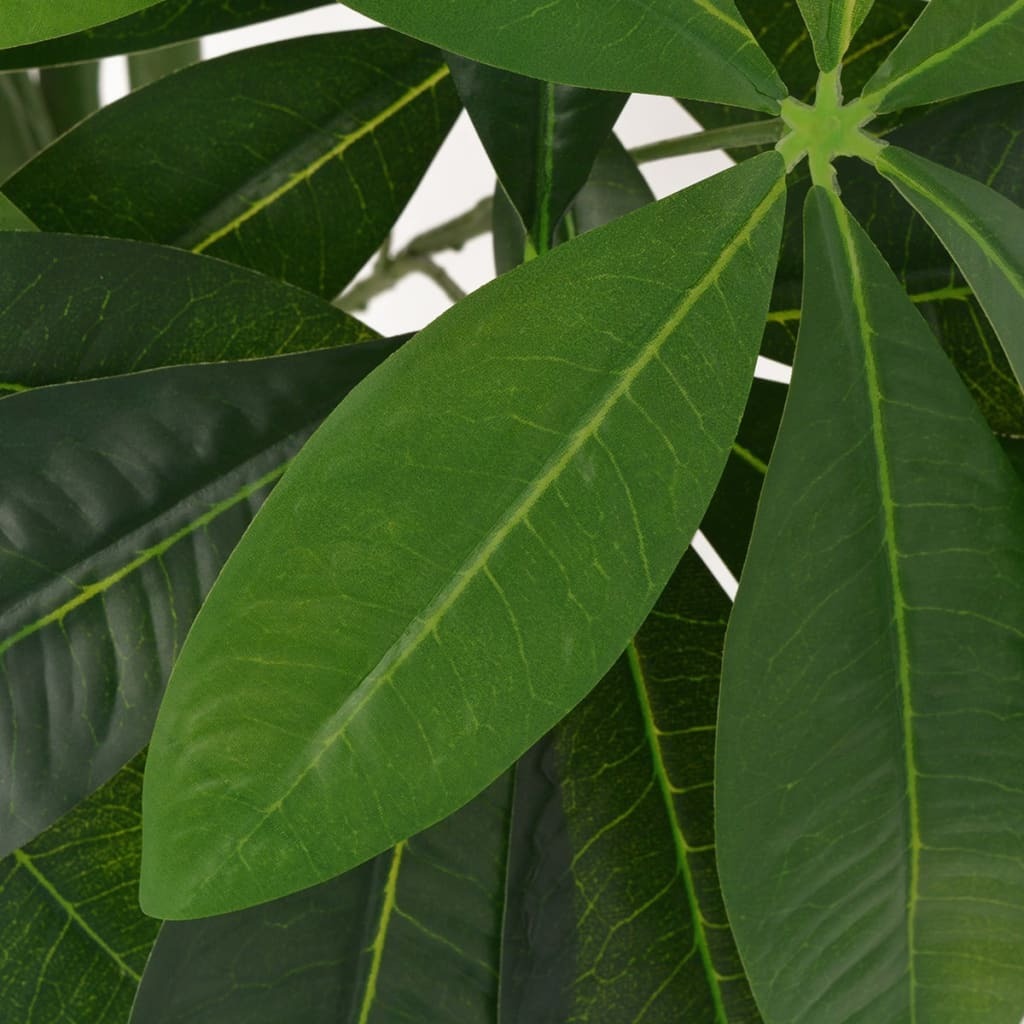 Close-up view of artificial fortune tree leaves showing lifelike synthetic plastic construction and vibrant green color