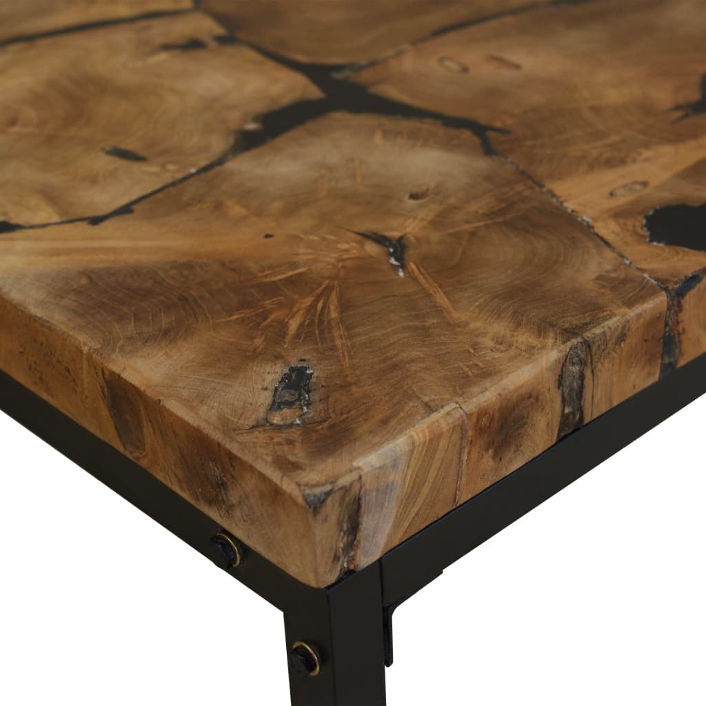 Detail view of teak coffee table construction and black metal framework