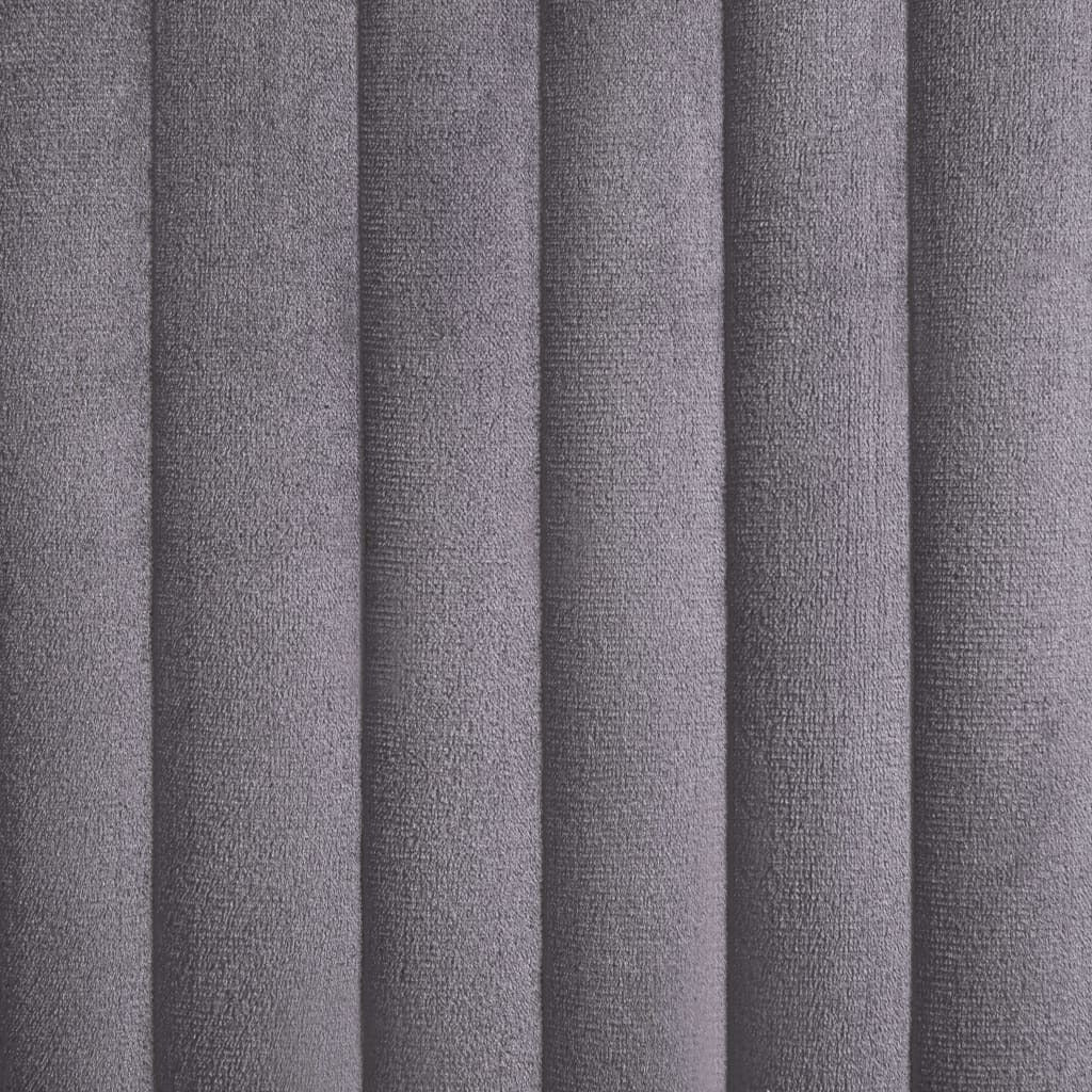 Gray velvet dining chair in modern dining room interior setting