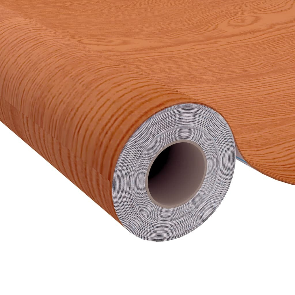 Detail view of light oak PVC film showing natural wood-look pattern and smooth matte texture for door wrapping