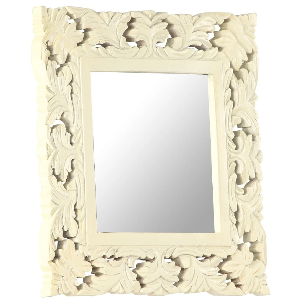 Close-up of carved geometric details on white mango wood frame showing how textured surface catches light and creates visual depth