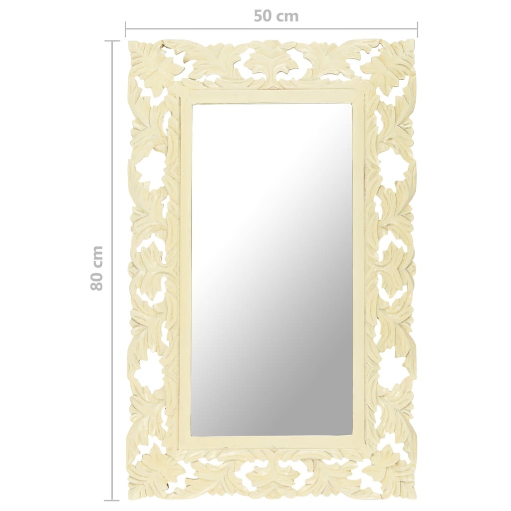 Decorative mirror with intricate carvings on a white background