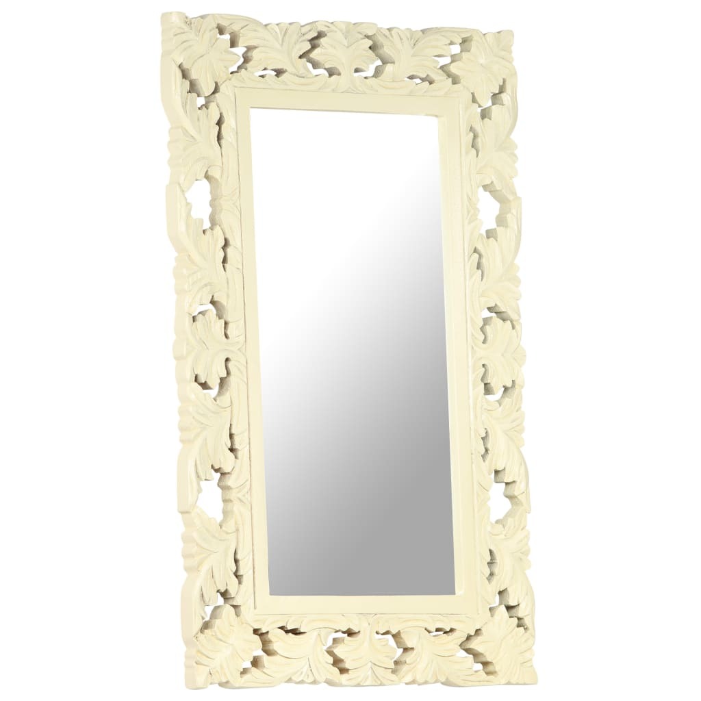 Decorative mirror with intricate carvings on a white background