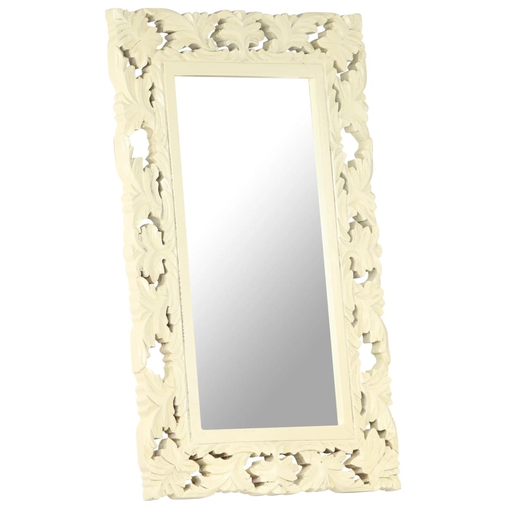 Decorative white mirror with intricate carvings on a white background
