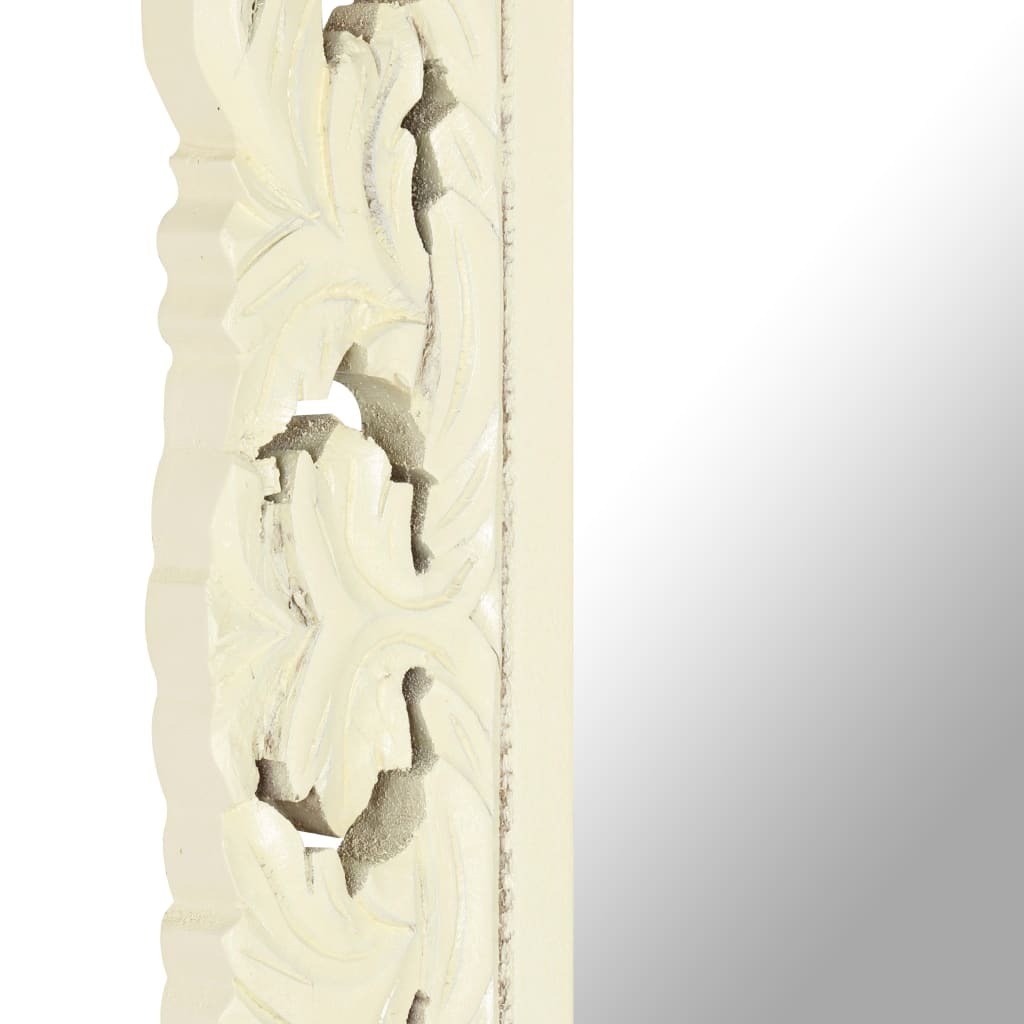 Detail shot of intricate carved pattern on white wood mirror frame highlighting traditional craftsmanship and unique artisan quality