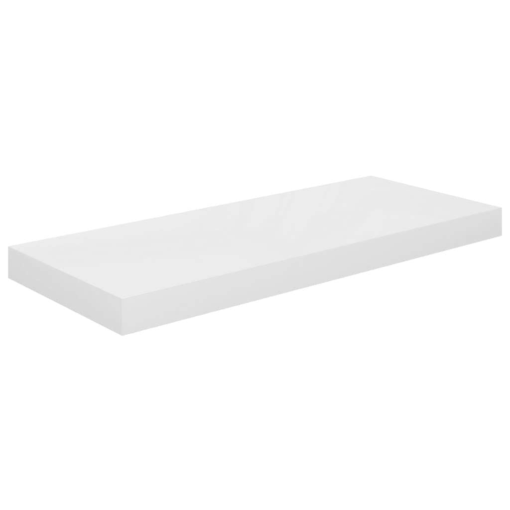 White floating wall shelf in modern bedroom interior with decorative items