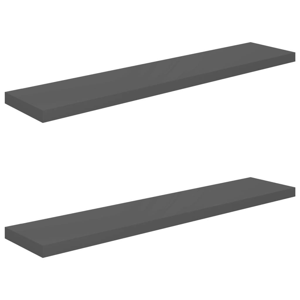 Grey floating wall shelves in modern bedroom interior with decorative items