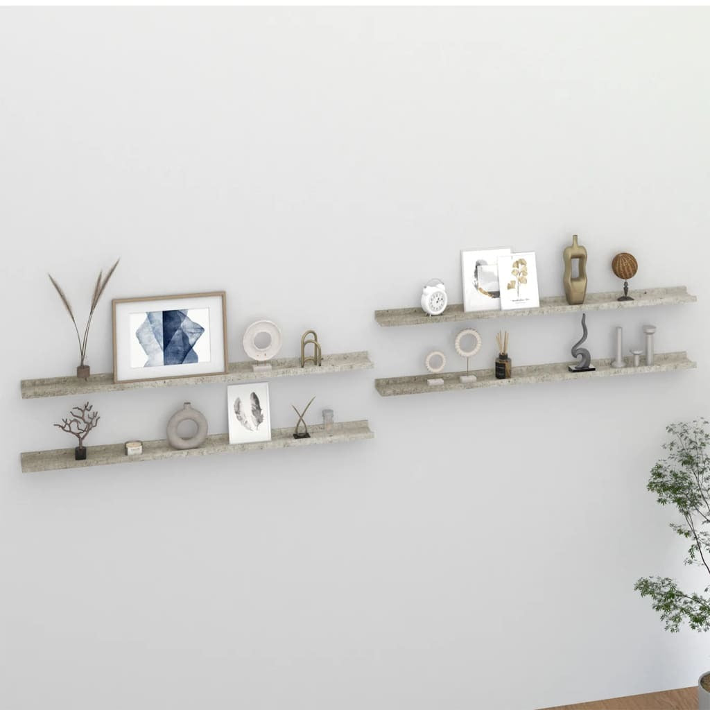 Set of 4 concrete gray wall shelves installed in modern living room displaying books and decorative items