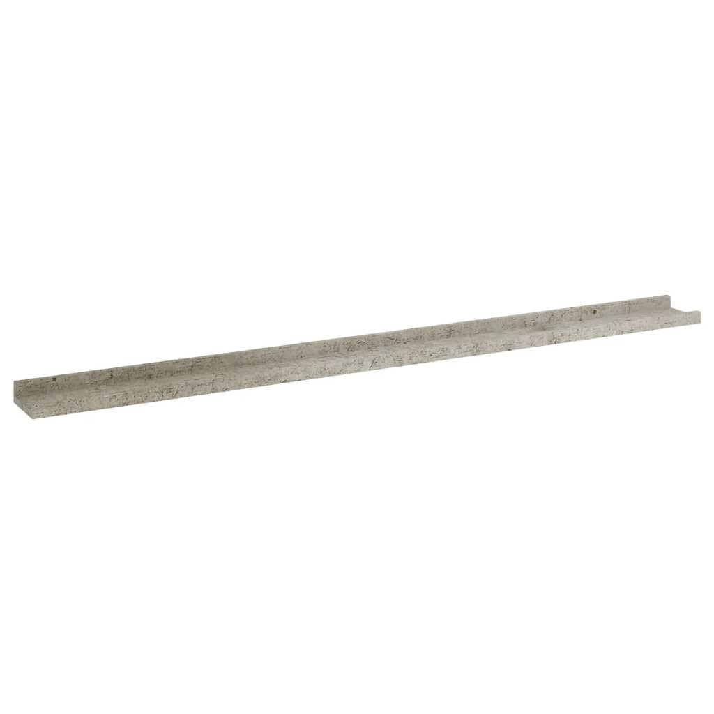 Concrete gray floating shelves arranged showing wall mounting system and modern aesthetic