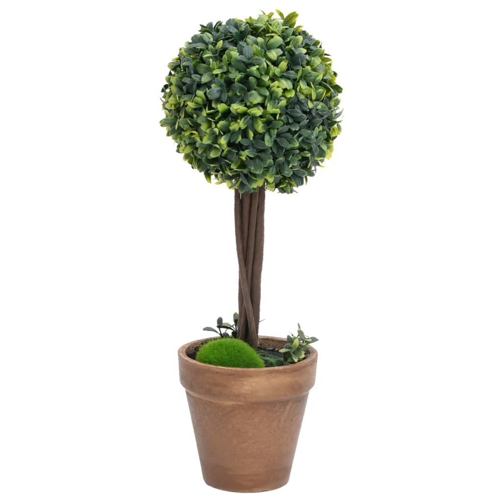 Close-up of realistic artificial boxwood ball topiary showing dense green foliage and lifelike texture for maintenance-free decoration