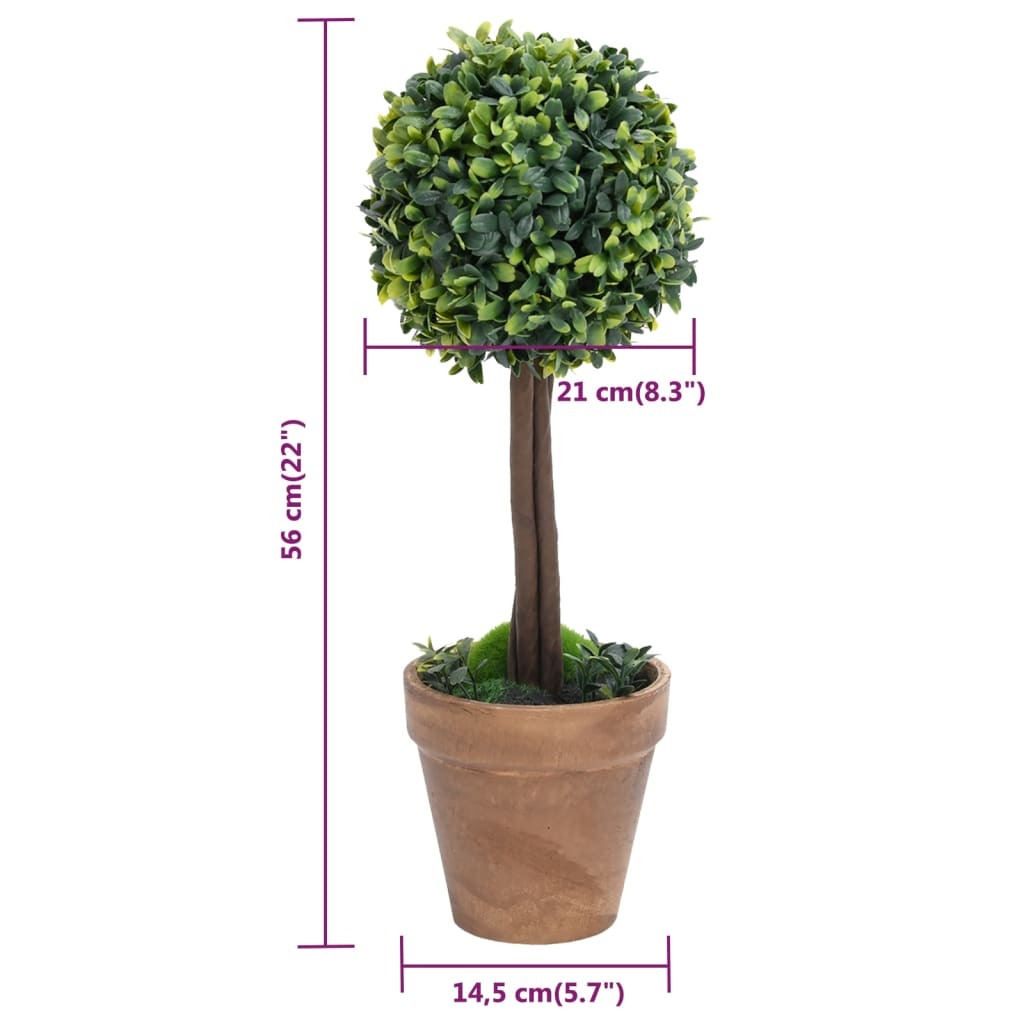 Set of 2 artificial boxwood topiaries flanking doorway showing elegant symmetrical arrangement for entryway decor