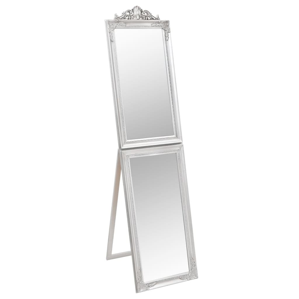 Close-up of baroque-style silver mirror frame showing ornate decorative details and antique metallic finish, premium luxury bedroom furniture