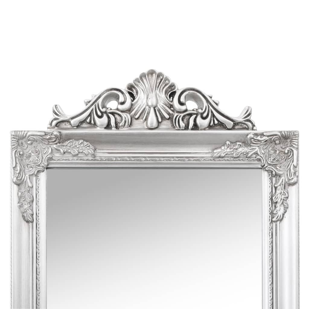 Detail of antique silver finish on baroque mirror frame highlighting quality construction and sophisticated vintage style