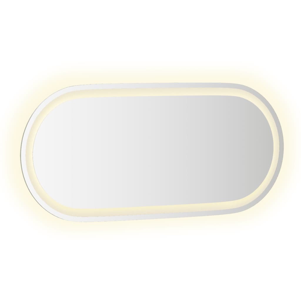 Modern oval bathroom mirror with built-in LED lighting creating spa-like ambiance for grooming