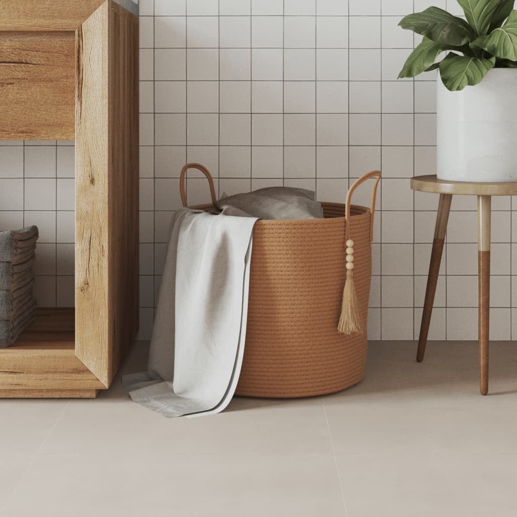 Collapsible cotton storage basket in brown color displaying sturdy construction and soft breathable material