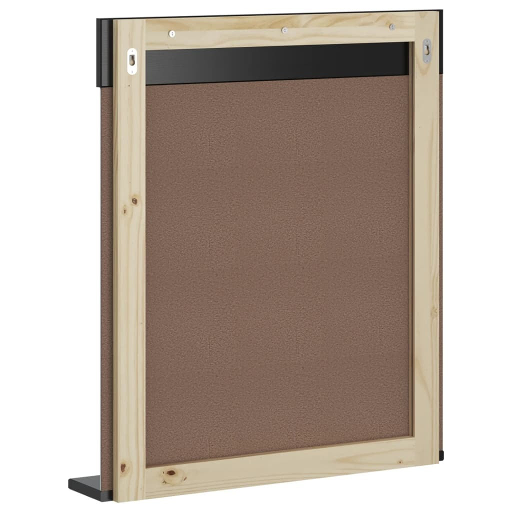 Wall-mounted black mirror with storage shelf installed in bathroom showing space-saving design