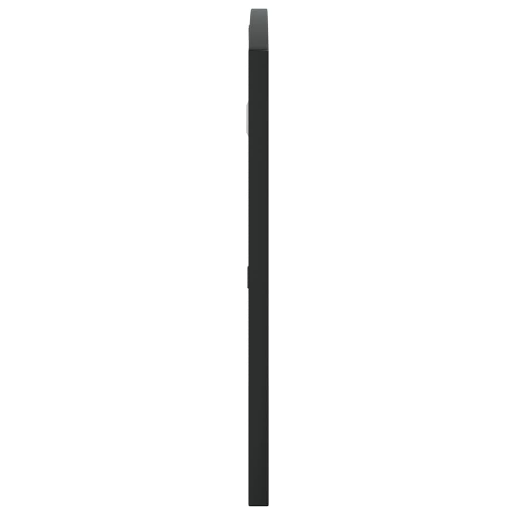 31.5 inch black wall mirror hanging in bathroom showing perfect size for vanity grooming