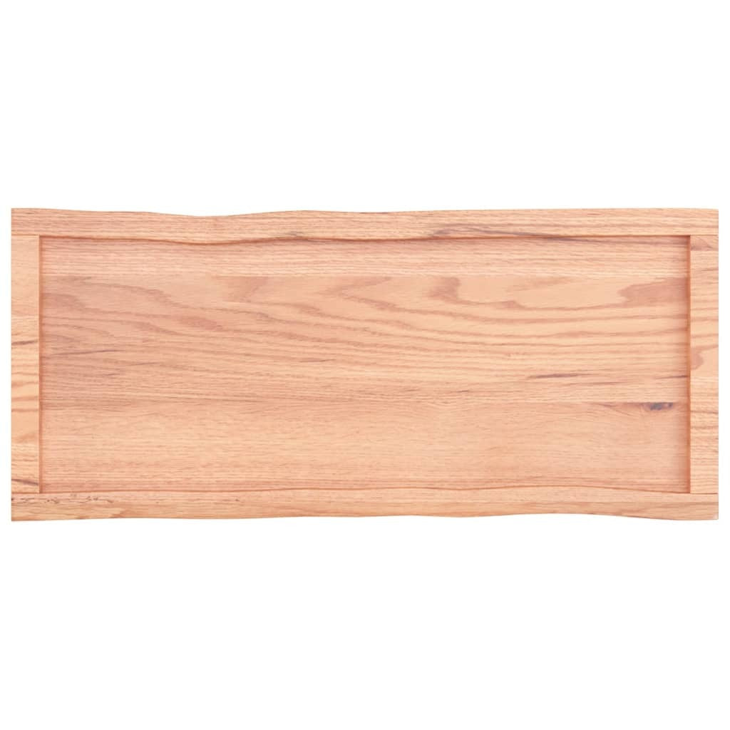 Detail of oak table top edge showing smooth finished surface and thickness