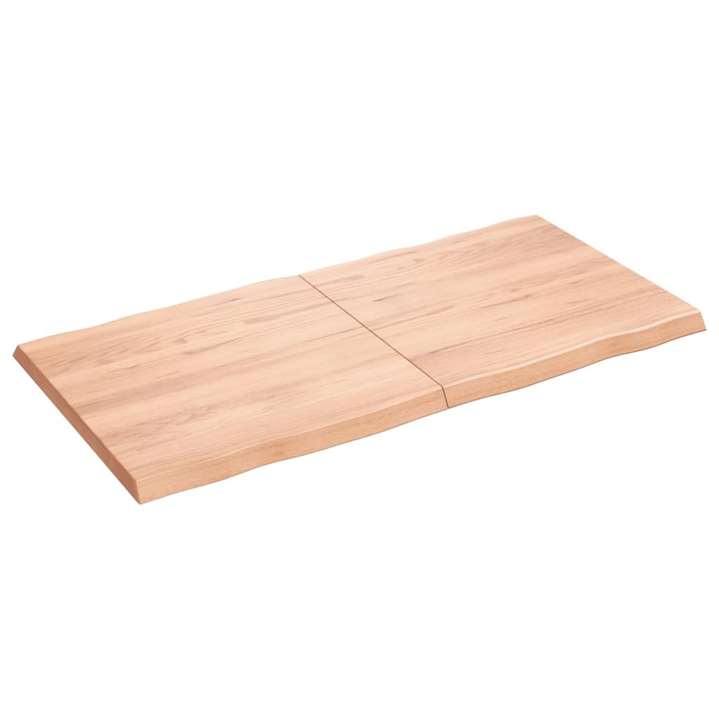 Detail of oak wood grain texture and natural finish on foldable table surface