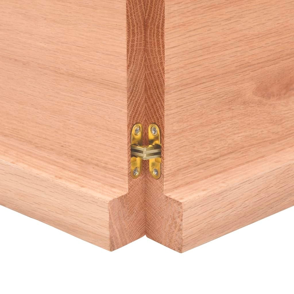 Construction details of foldable oak wood table showing quality craftsmanship