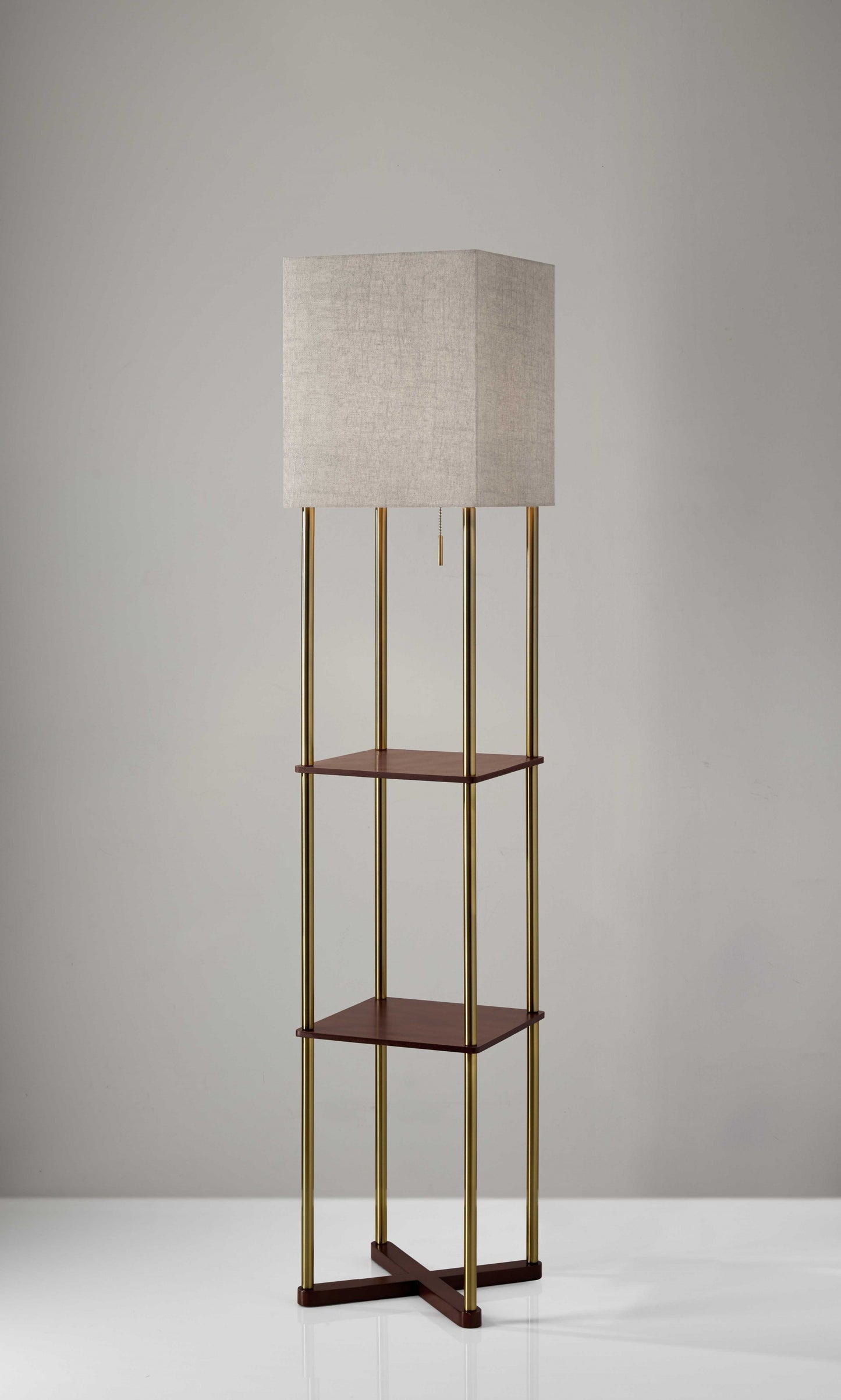 Full room setting showing modern column floor lamp with gray square shade providing ambient lighting in contemporary living space