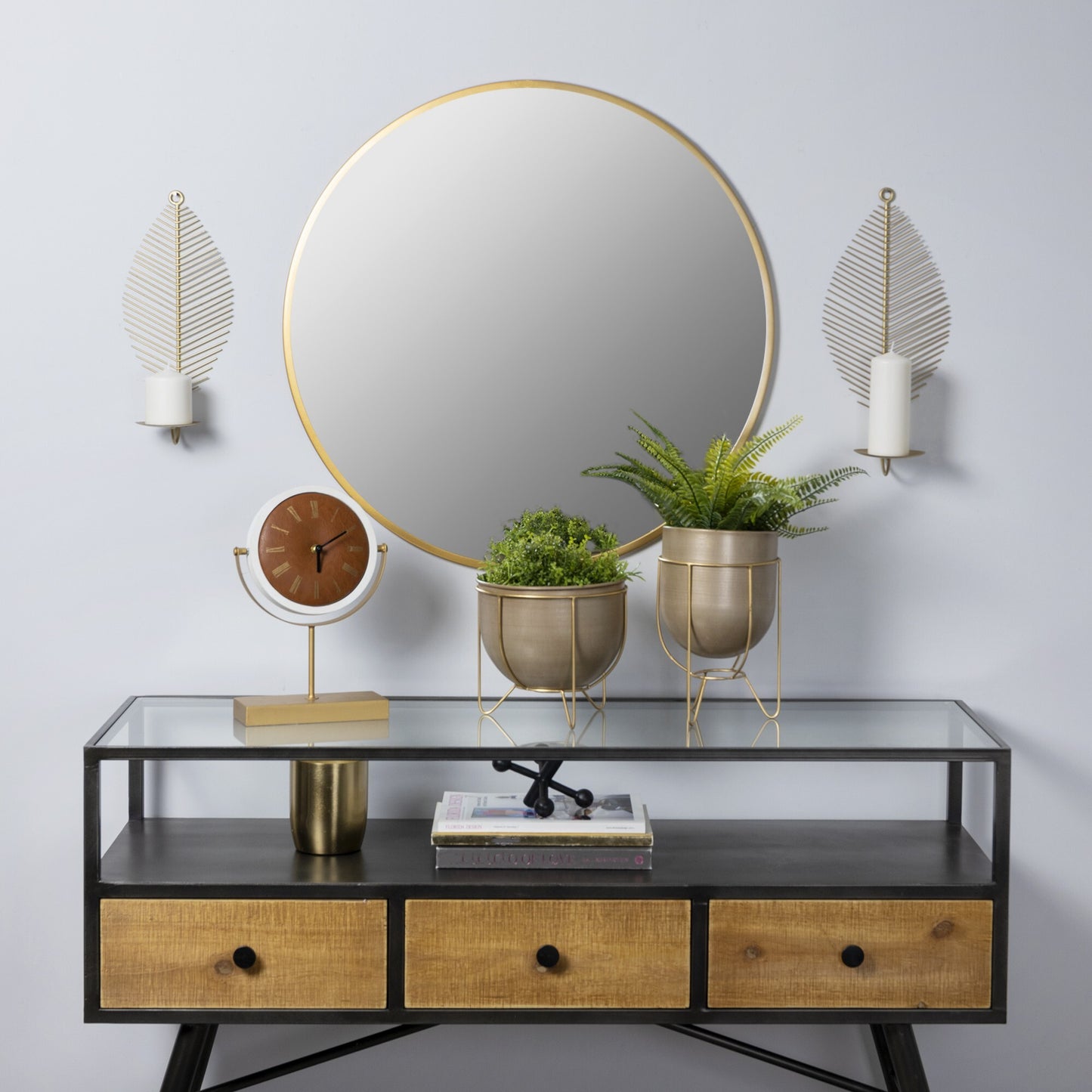 Designer bronze and gold metal planter on display, versatile for succulents and small plants