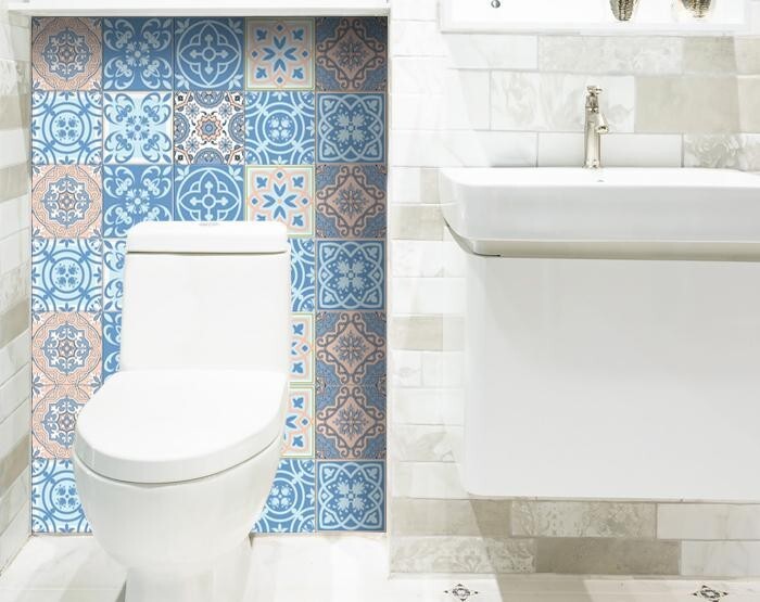 Ocean blue mosaic peel and stick tiles arranged in grid pattern showing installation layout