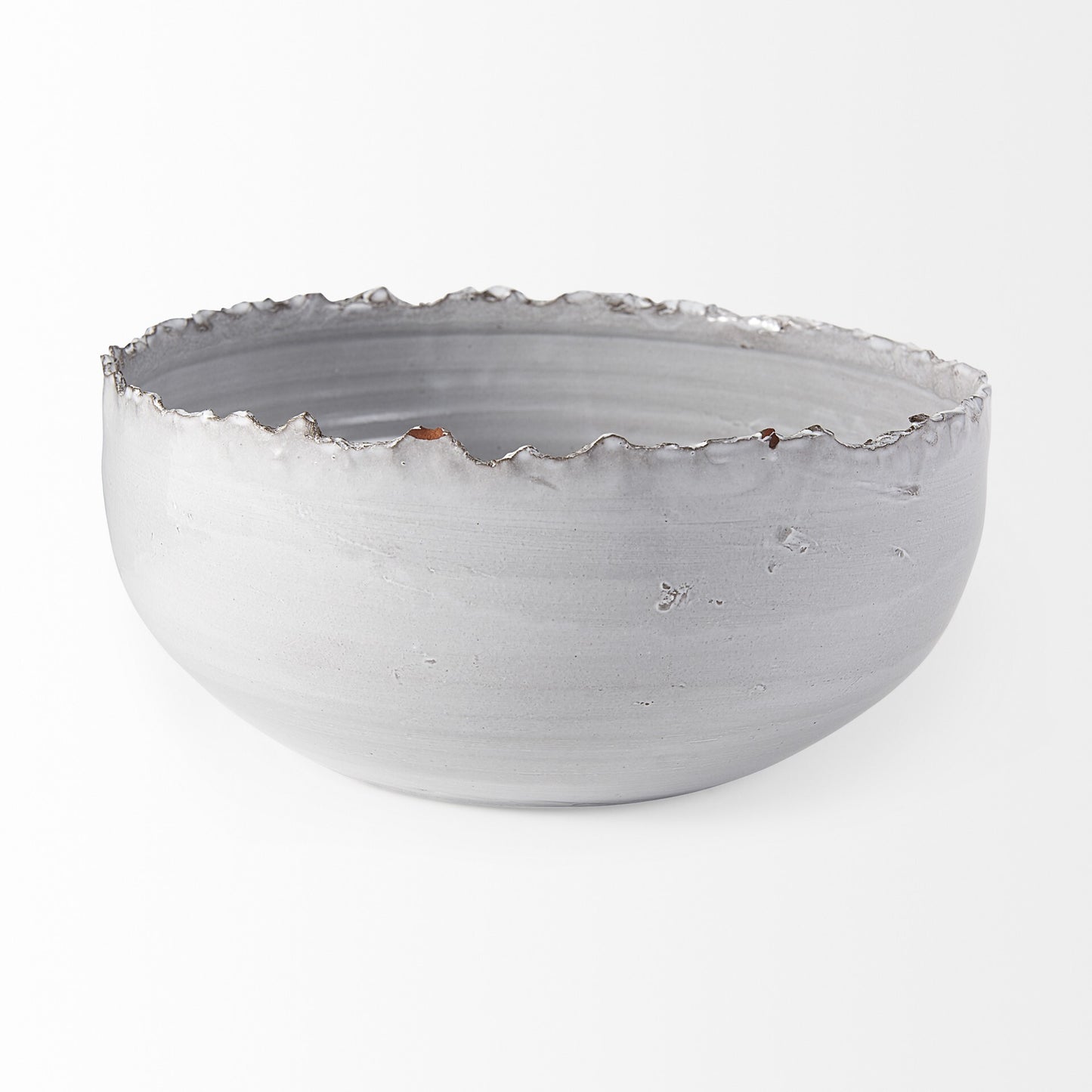 Modern rustic centerpiece bowl close-up displaying artisan-inspired glaze technique and uneven scalloped rim detail