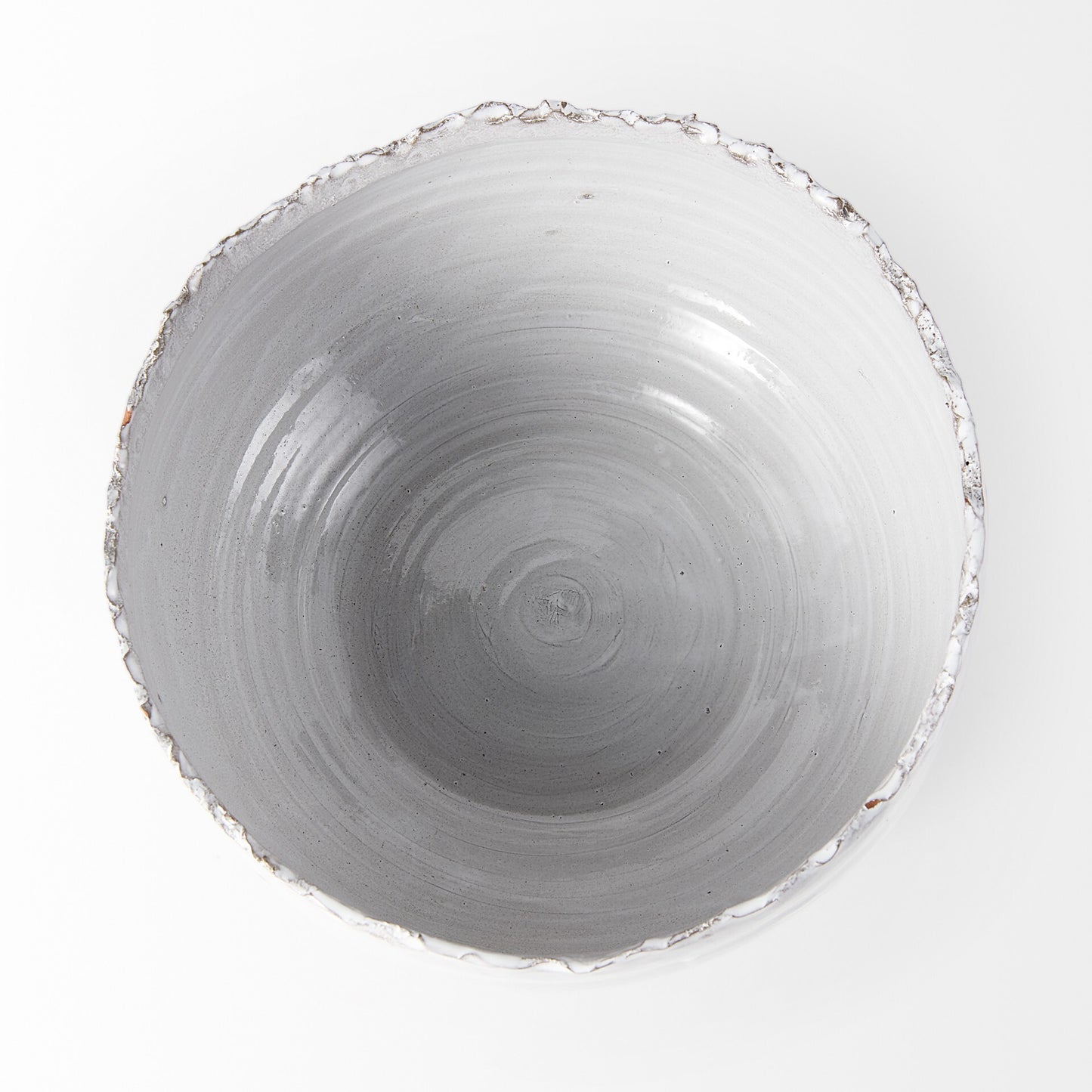 Artisan ceramic centerpiece bowl top view showing scalloped rim design and two-tone glaze pattern