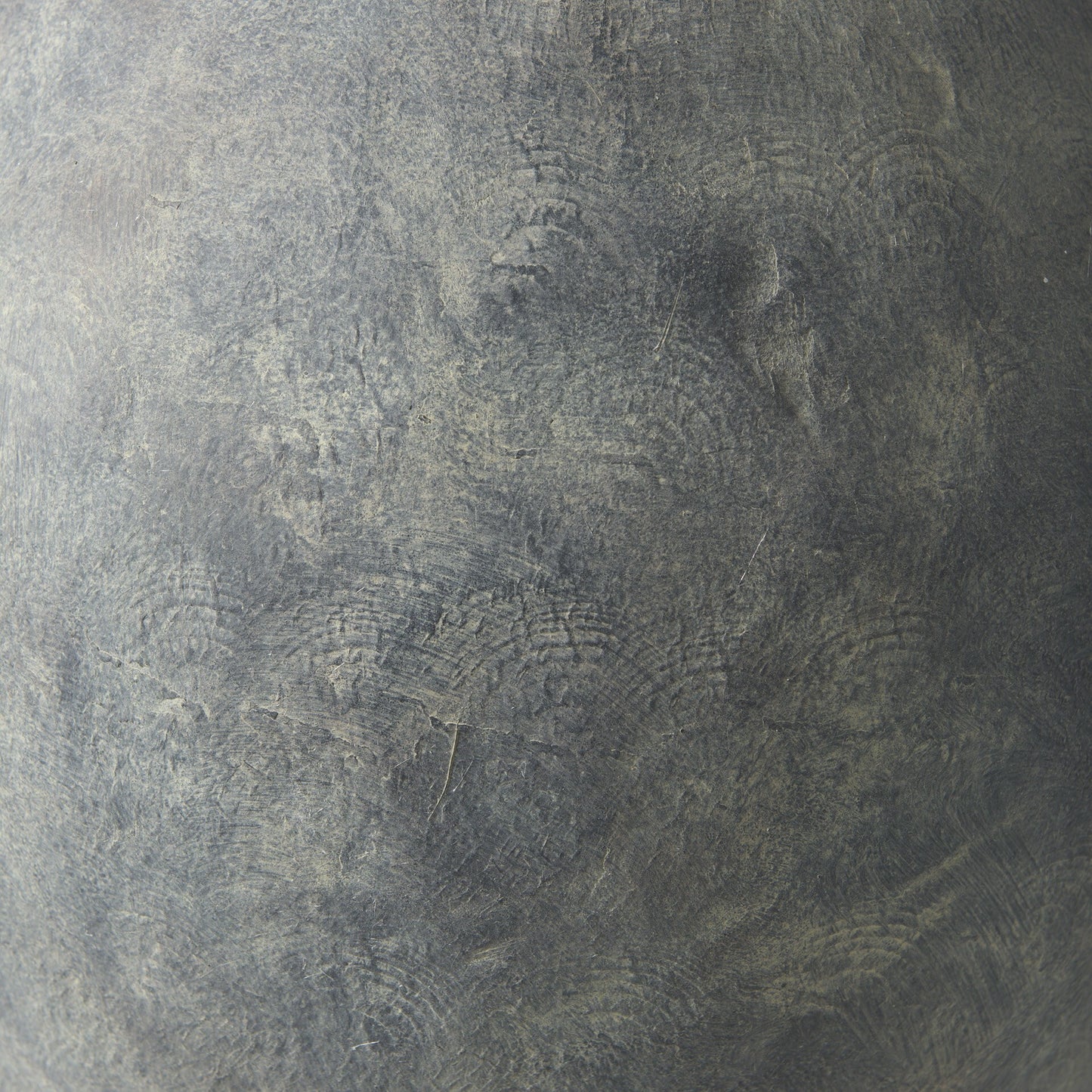 Earthy Kyros vase featuring matte gray finish and distressed texture perfect for casual modern interiors