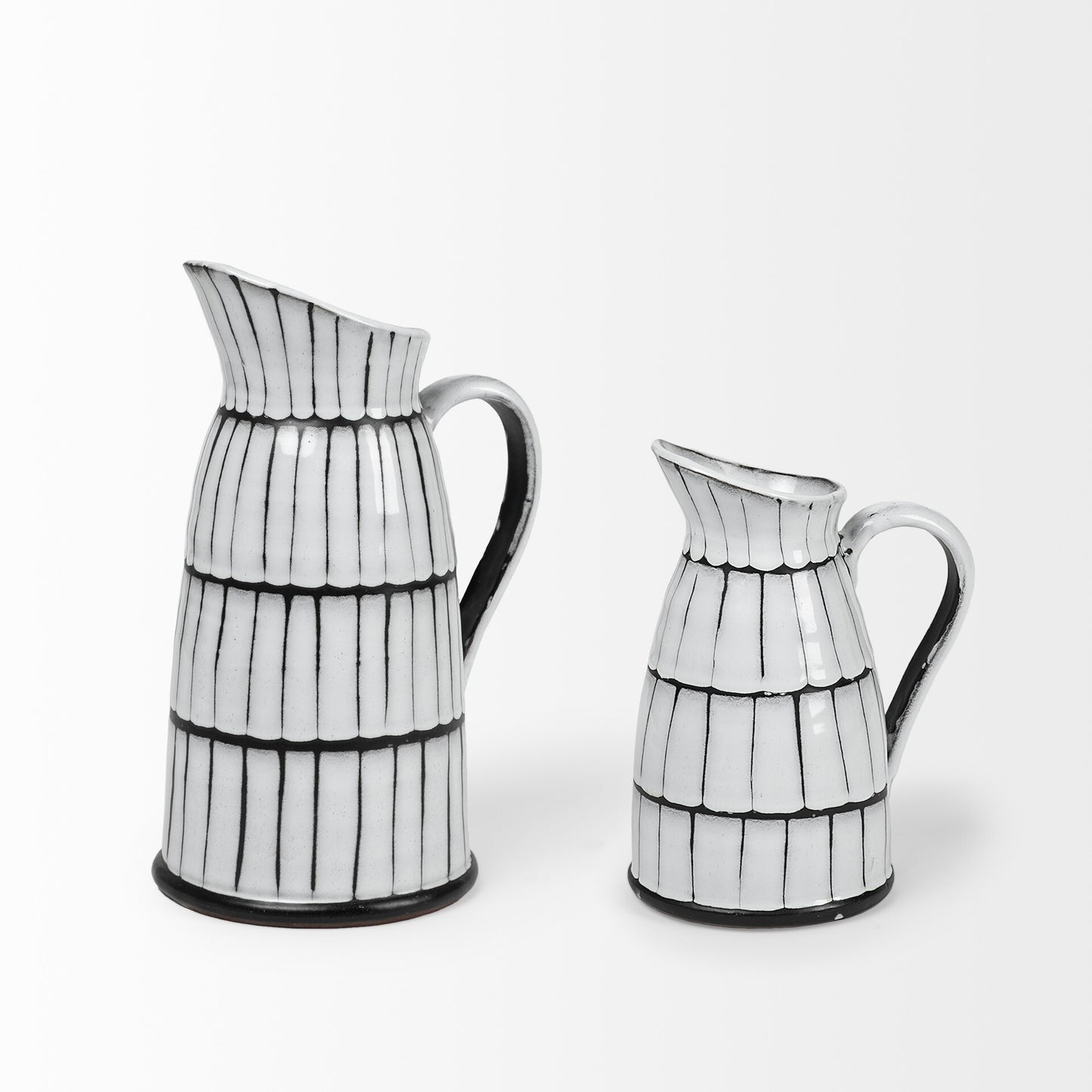 Side view of 10-inch ceramic pitcher with organic black and white artisan glaze finish