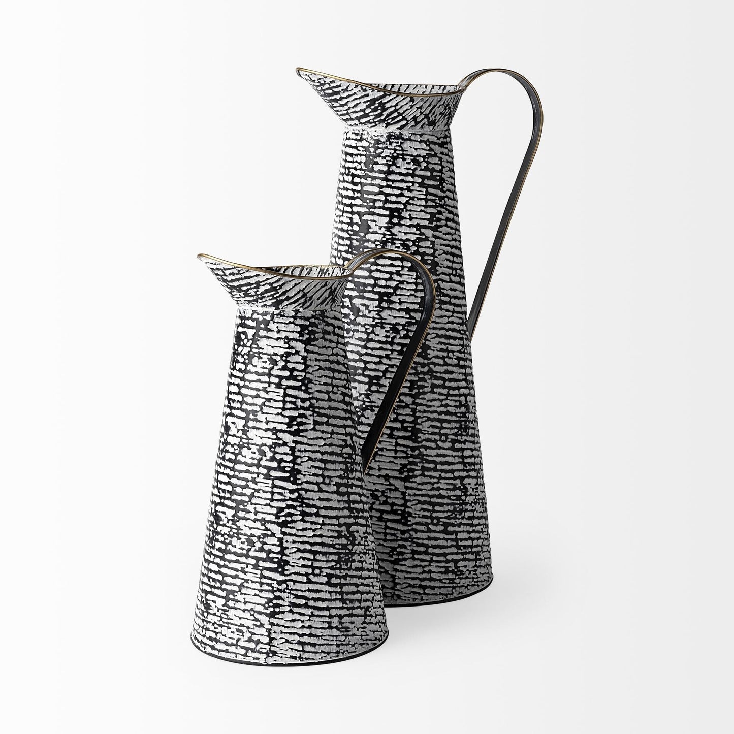 Contemporary metal jug vase close-up displaying unique textured pattern finish in black and white