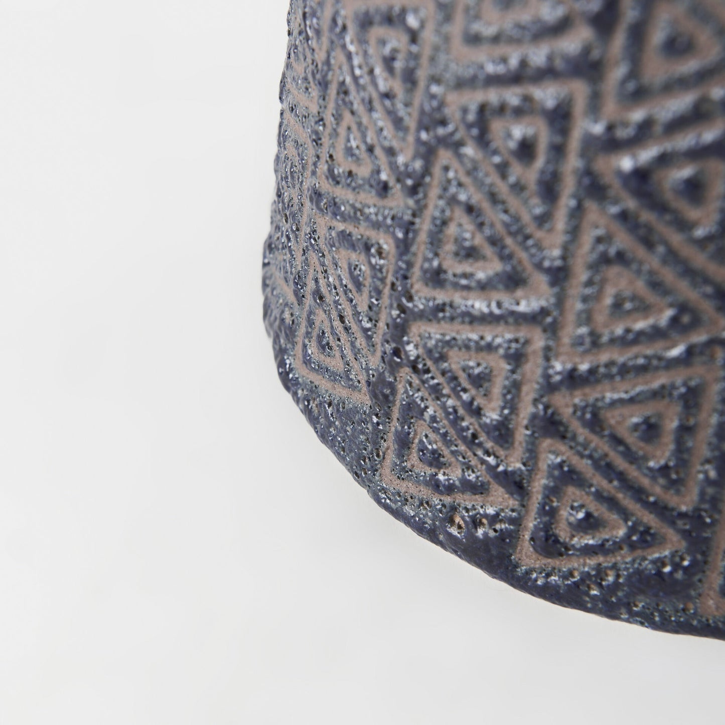 Alternative angle of decorative ceramic vase with tribal pattern, perfect for modern or rustic home decor styling