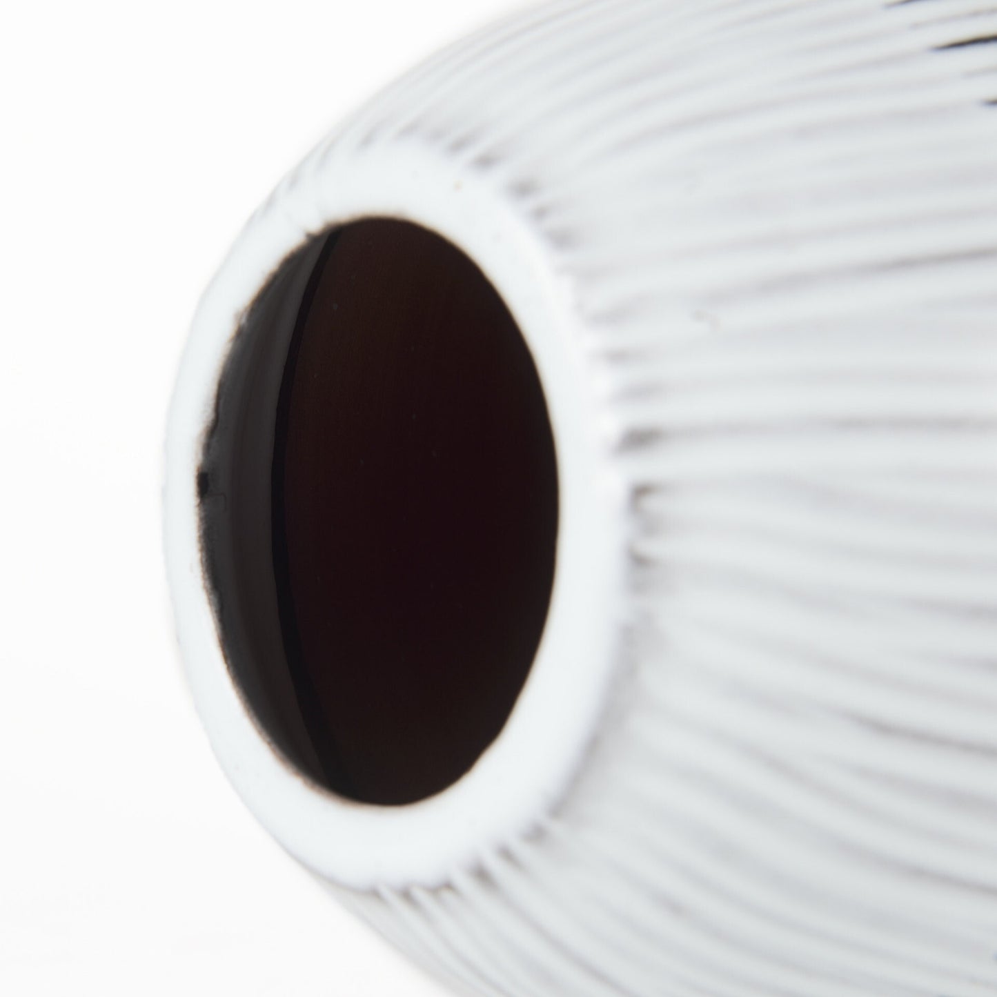 Textured striped ceramic vase showing complete 13 inch height and unique architectural pod design