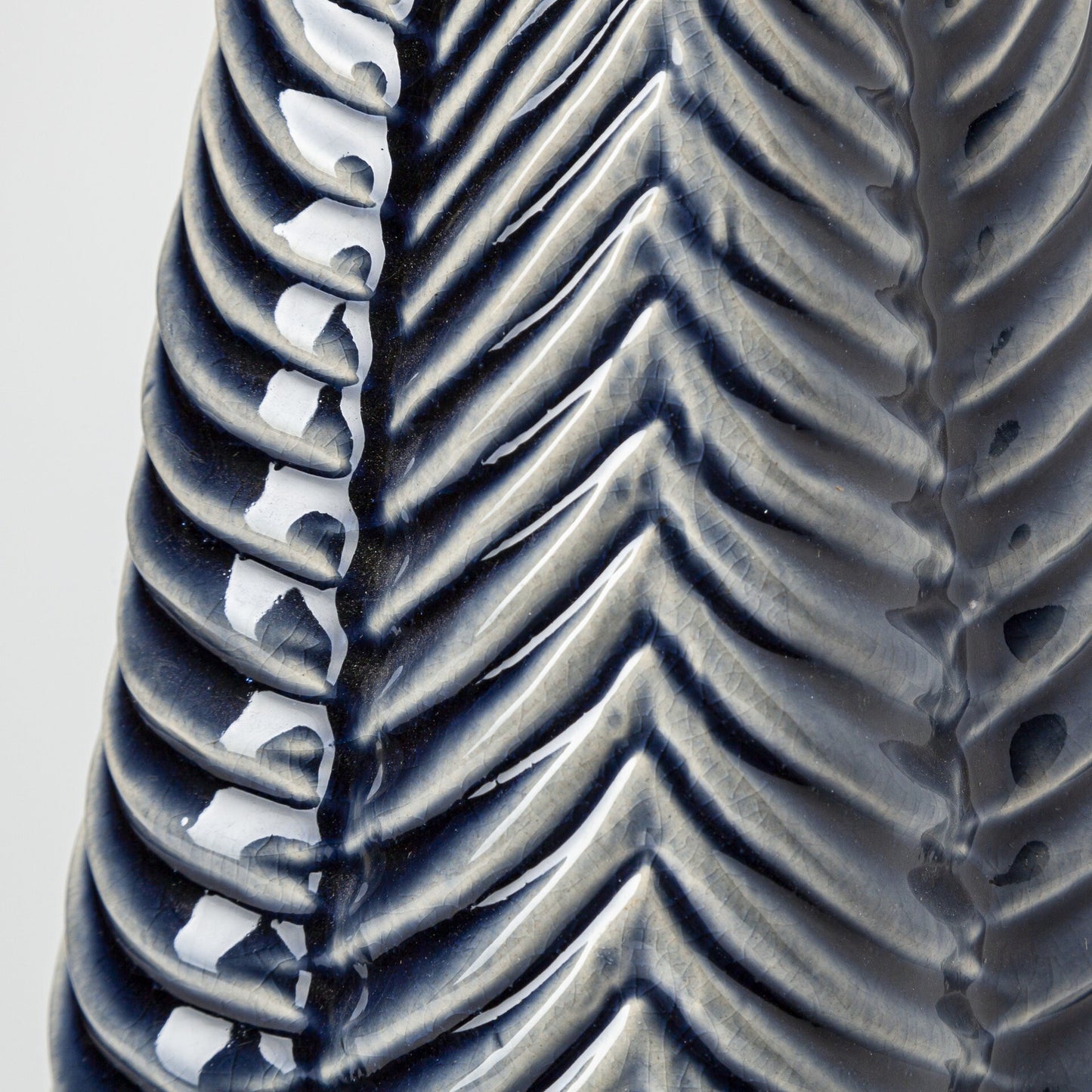 Top view of Prussian blue star vase showing four-pointed opening and carved pattern details, ideal for floral arrangements or standalone art display