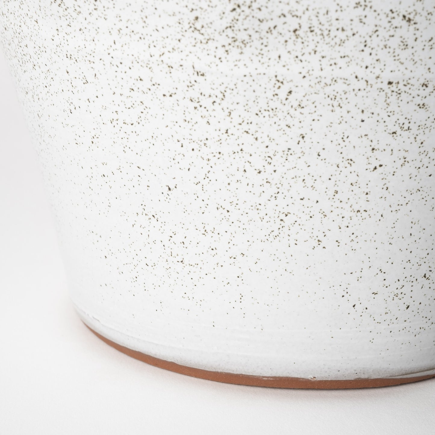 Textured white ceramic vase full view demonstrating 14 inch height ideal for dramatic displays