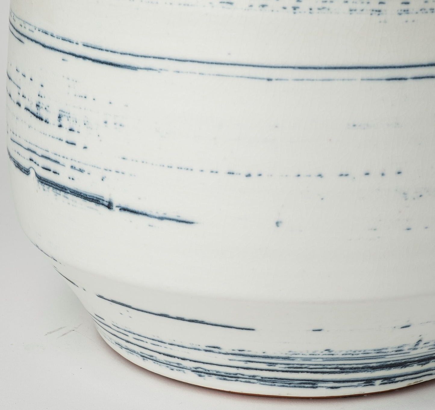 Blue white and sand coastal ceramic vase showing casually elegant style and organic earthy accent for modern home decor