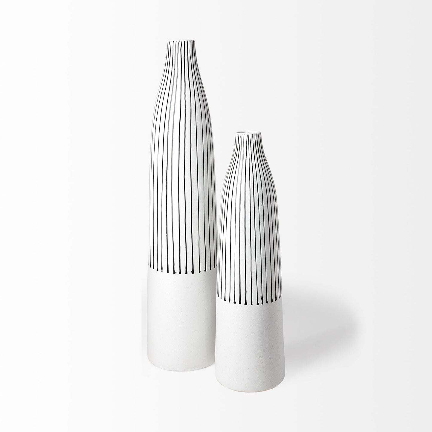Side view of tall narrow black and white striped ceramic vase, perfect for single stem flowers