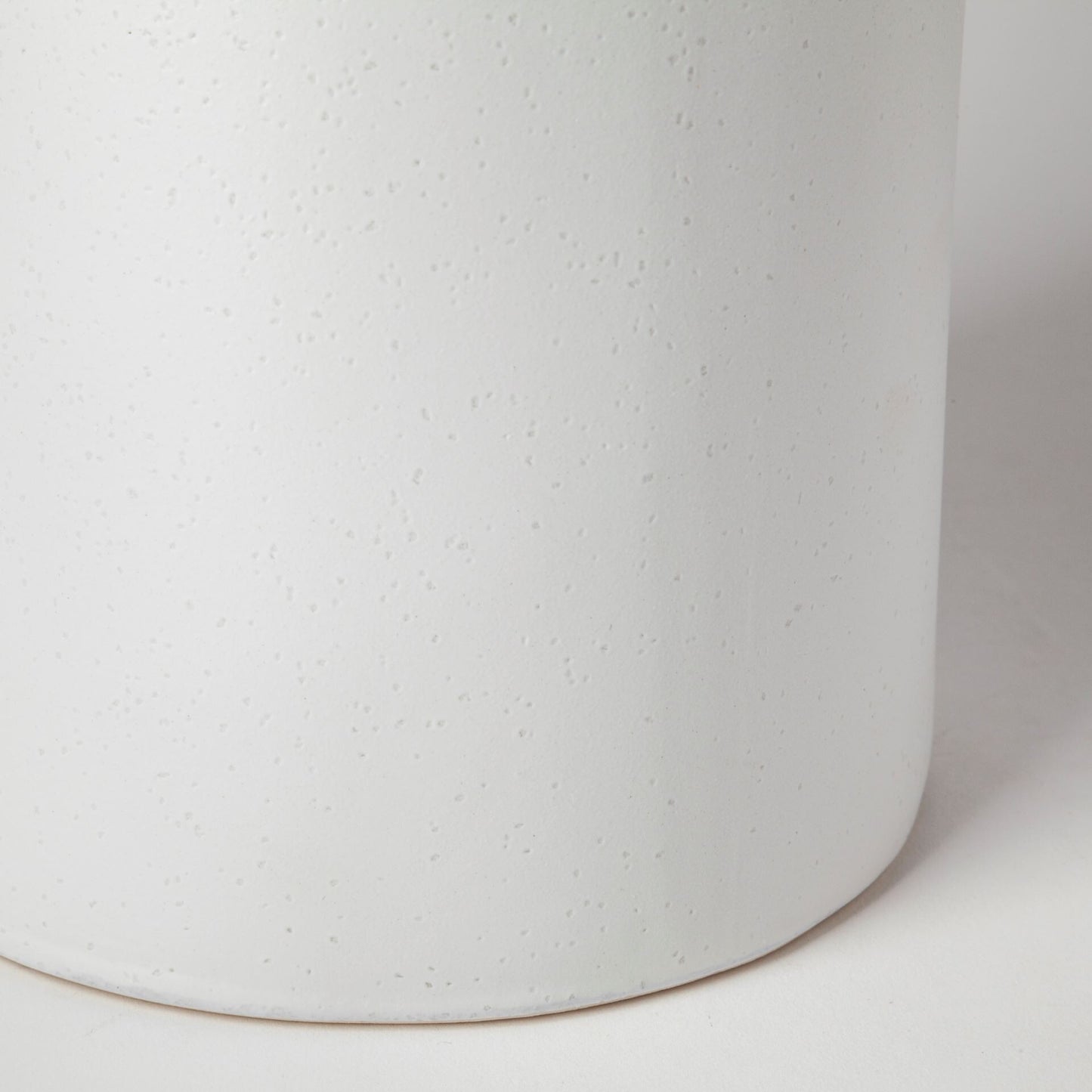 Black and white striped narrow cylinder vase on display, versatile table centerpiece decor