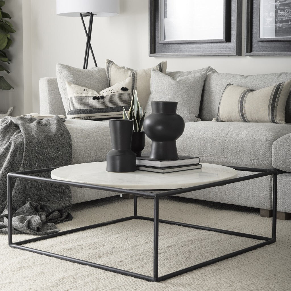 Full profile of matte black geometric ceramic vase showing complete three-tier design from conical base to top, versatile decorative accent for any contemporary space