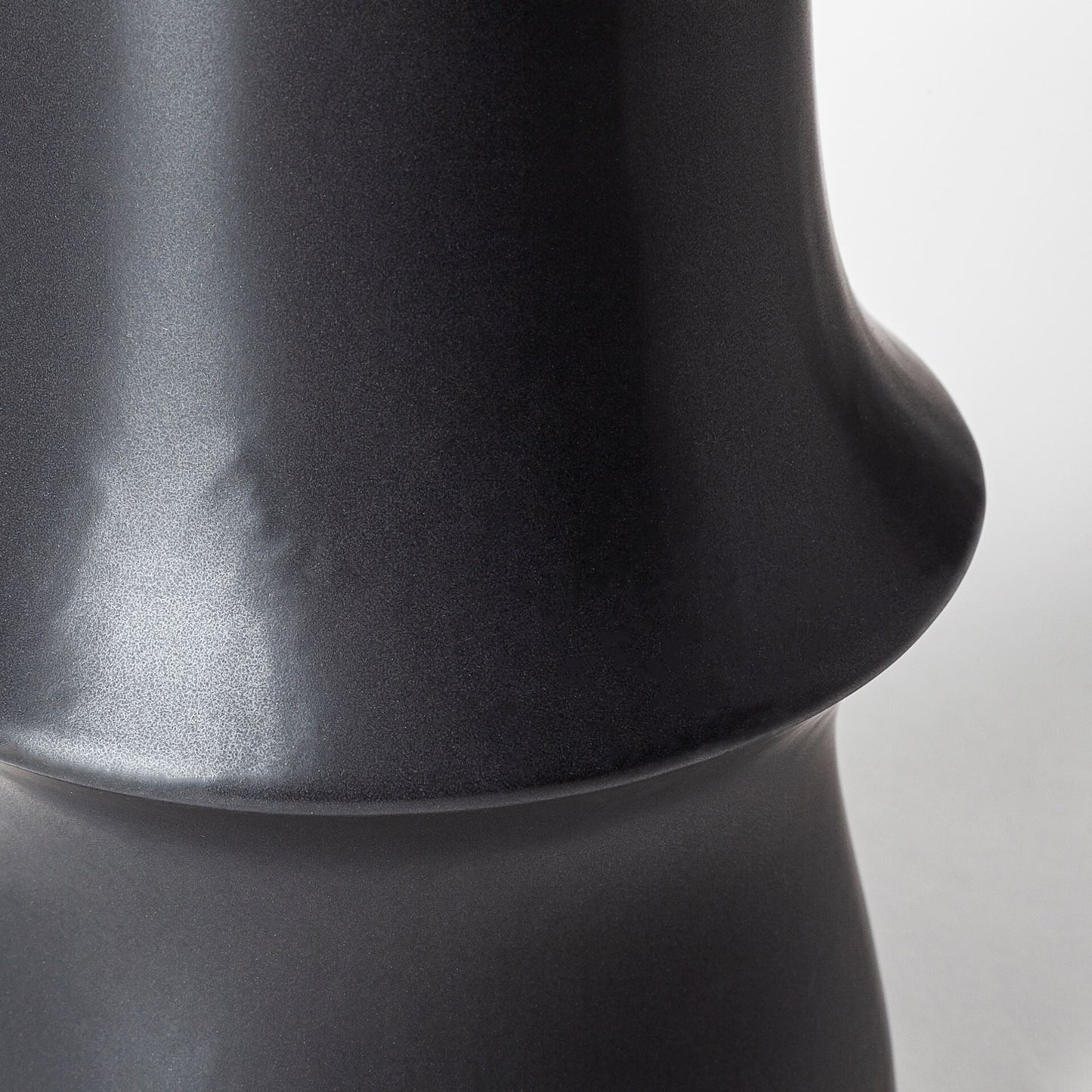 Black decorative ceramic vase alternative angle showing versatile modern home decor piece