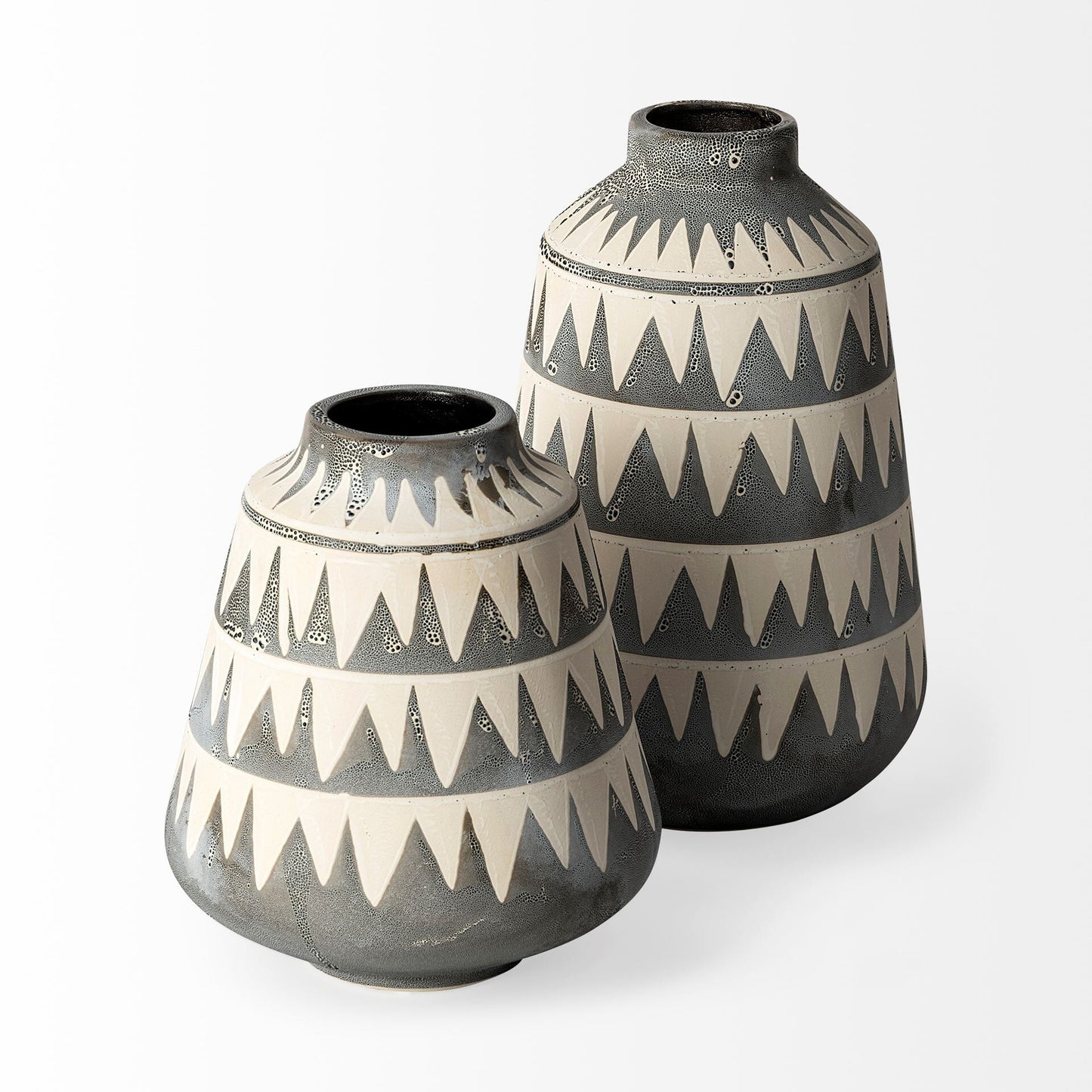 Geometric triangle vase close-up displaying zigzag pattern and elegant narrow mouth wide body shape