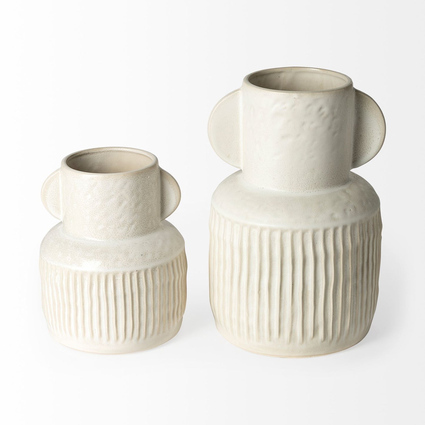 Close-up of whitewash finish and striped carved pattern on farmhouse ceramic vase base