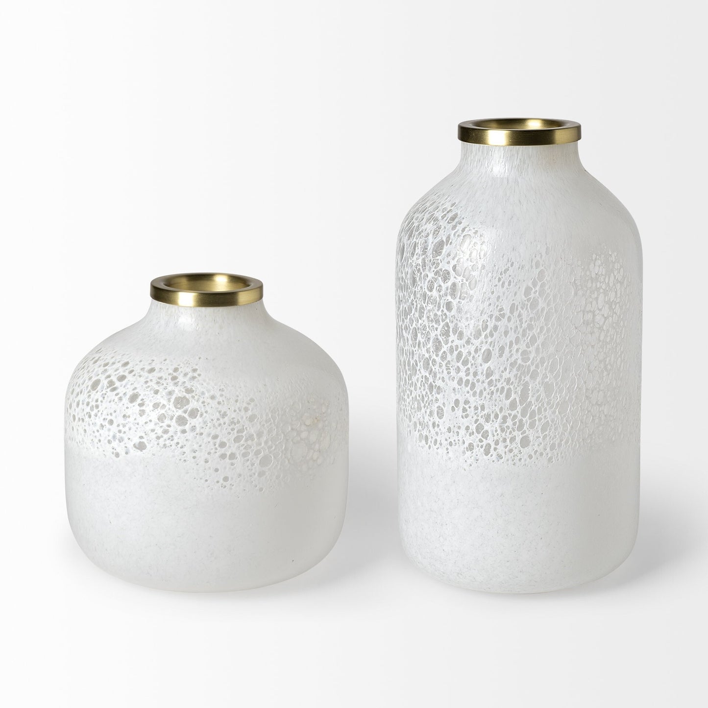 Side angle of modern glass vase displaying unique rounded square bottle shape with pearl white finish and glamorous gold rim detail