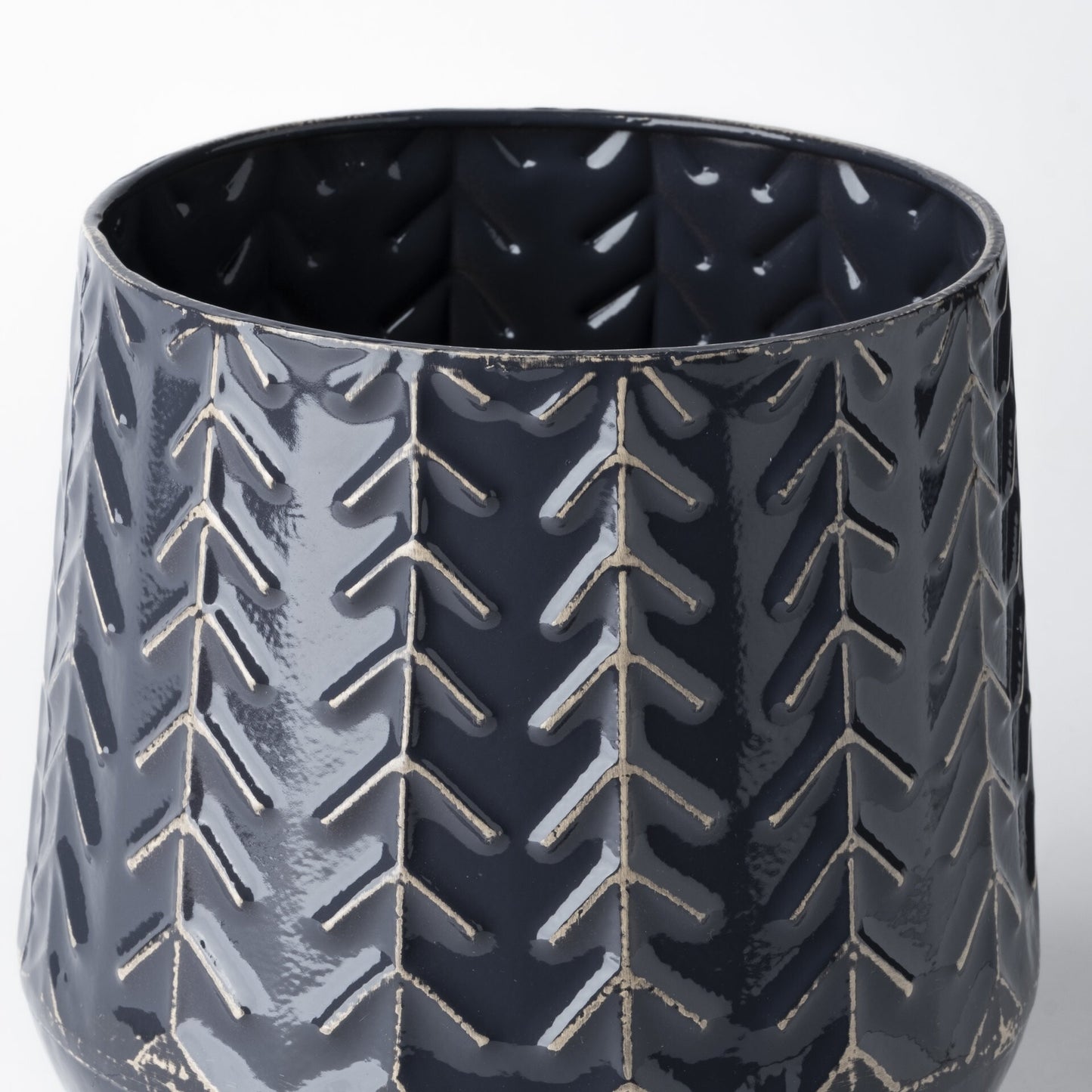 7 inch metal vase navy blue detail shot highlighting organic embossed pattern and quality