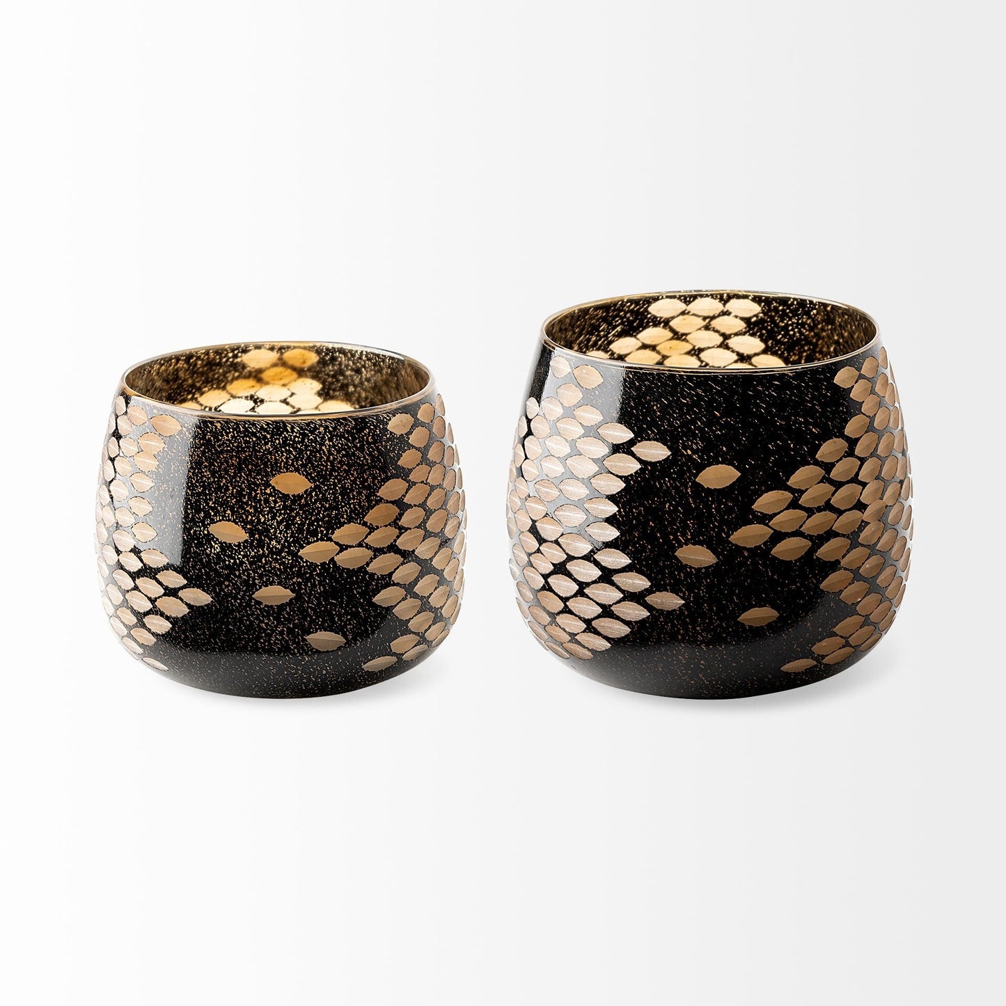 Close-up of snakeskin inspired pattern and gold speckles on black artisan bubble glass vase