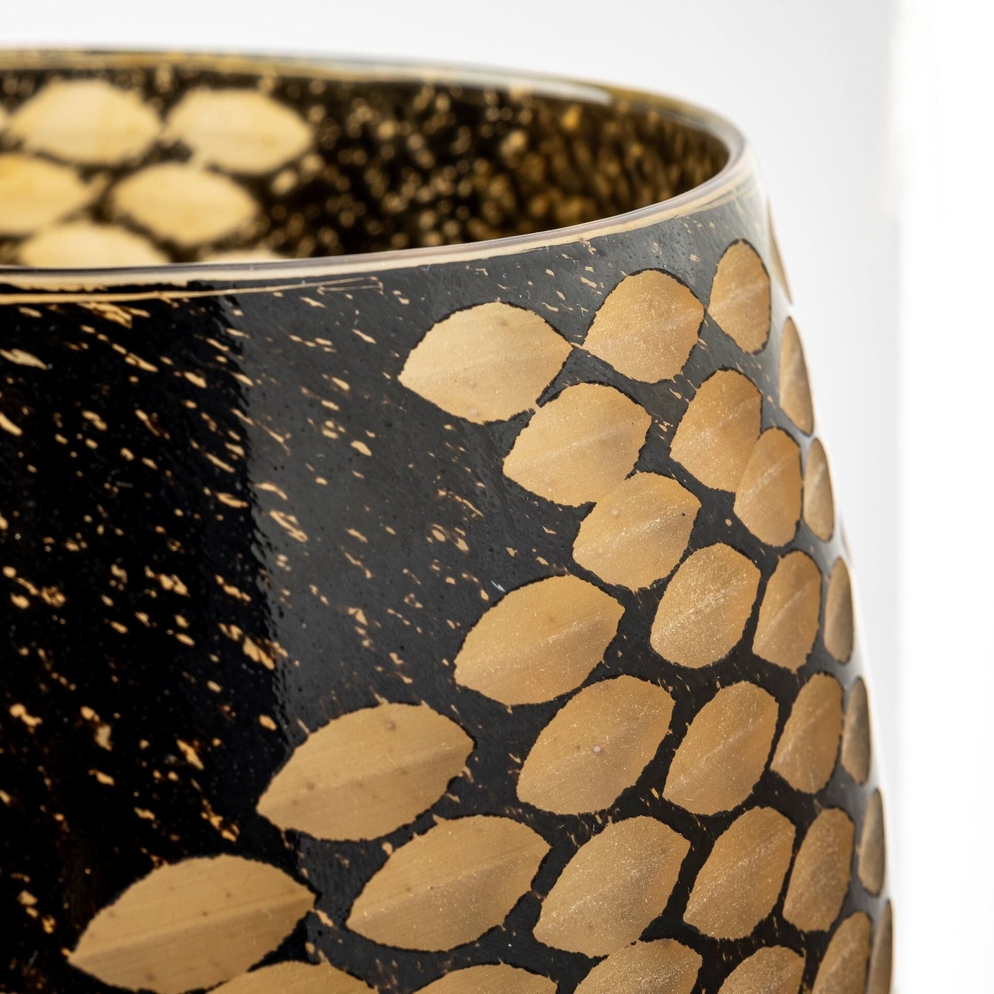 Unique crystal glass vase featuring bold black and gold colors with snakeskin textured pattern