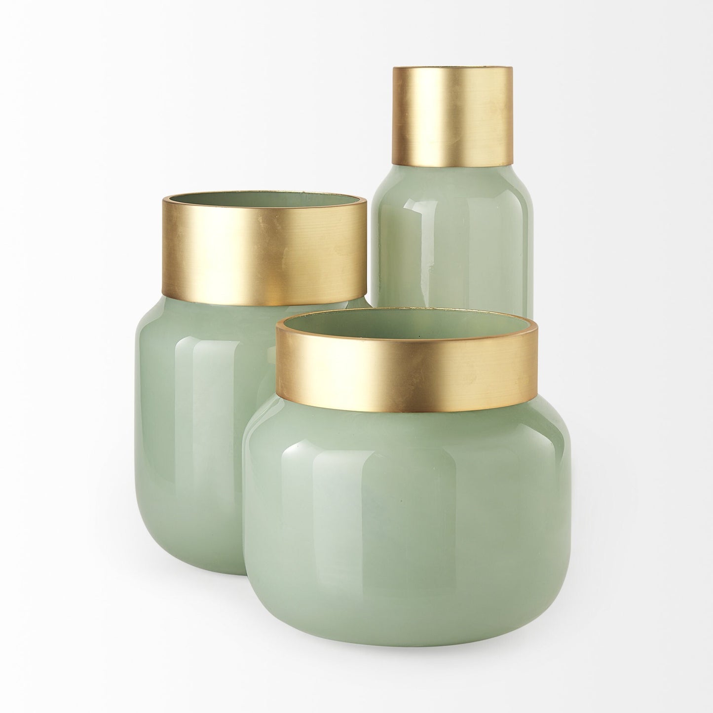 Detail of gold metal cuff rim on smokey green glass vase showing premium crystal glass construction and modern design