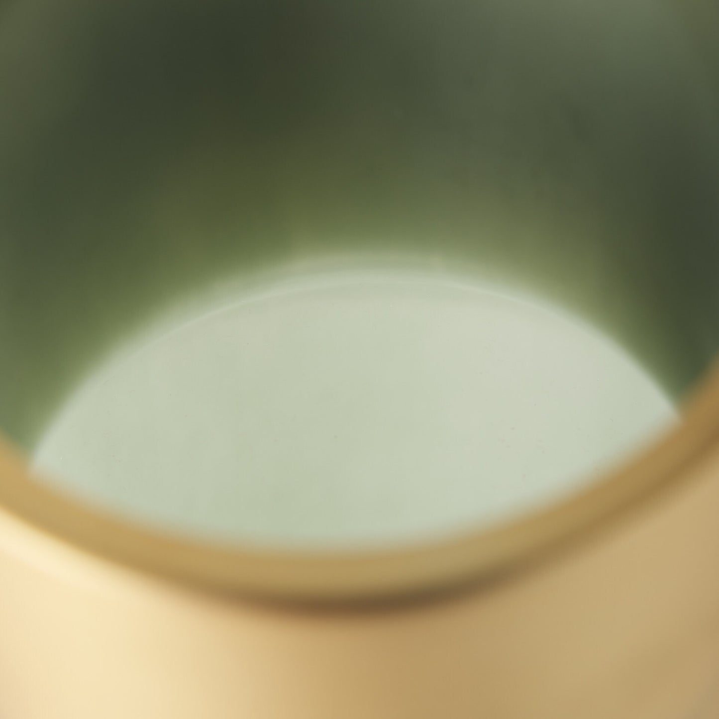 Smokey green narrow cylinder vase with gold accent showing unique modern retro style for contemporary interior decoration